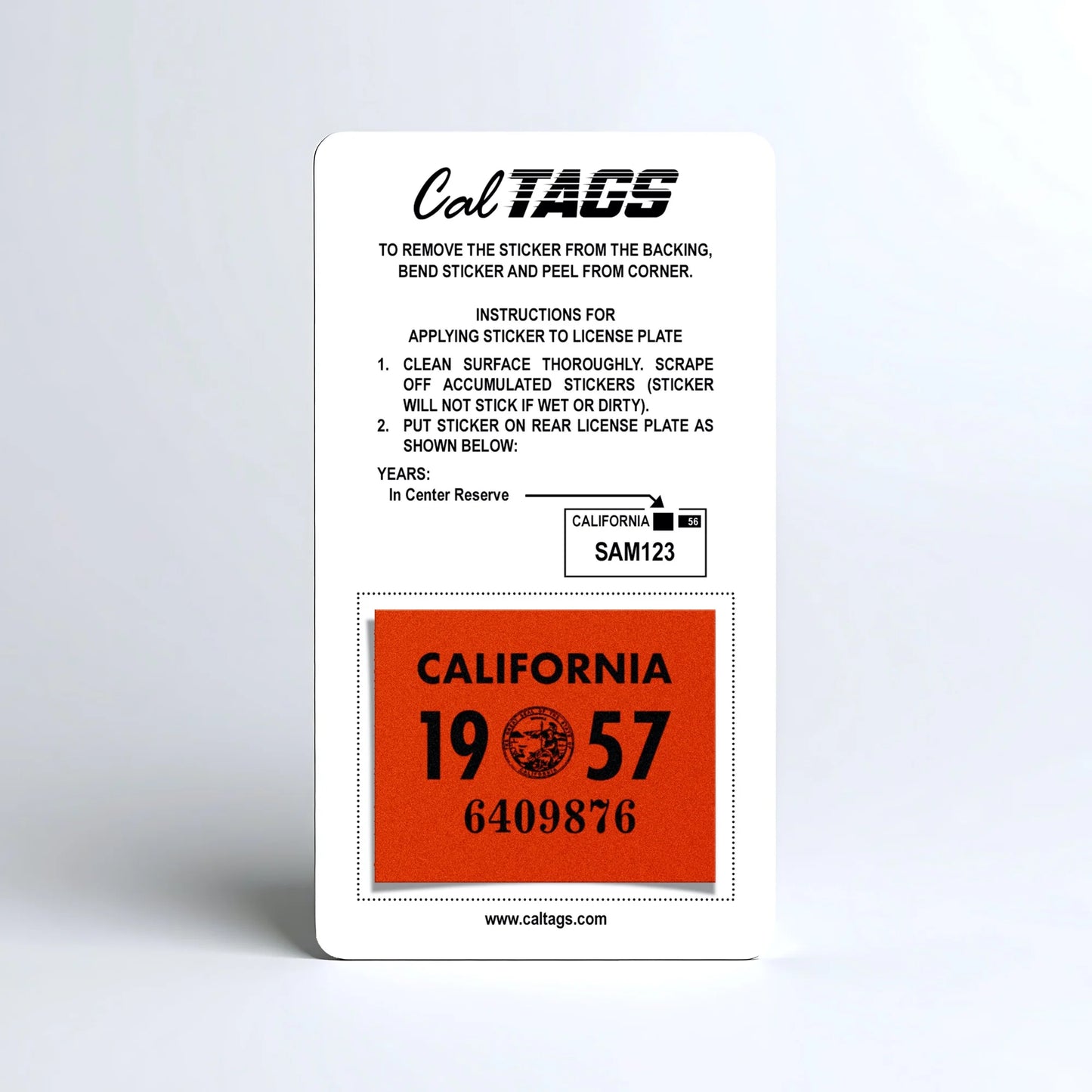California license plate 1957 year sticker mounted on CalTags display card — YOM Series