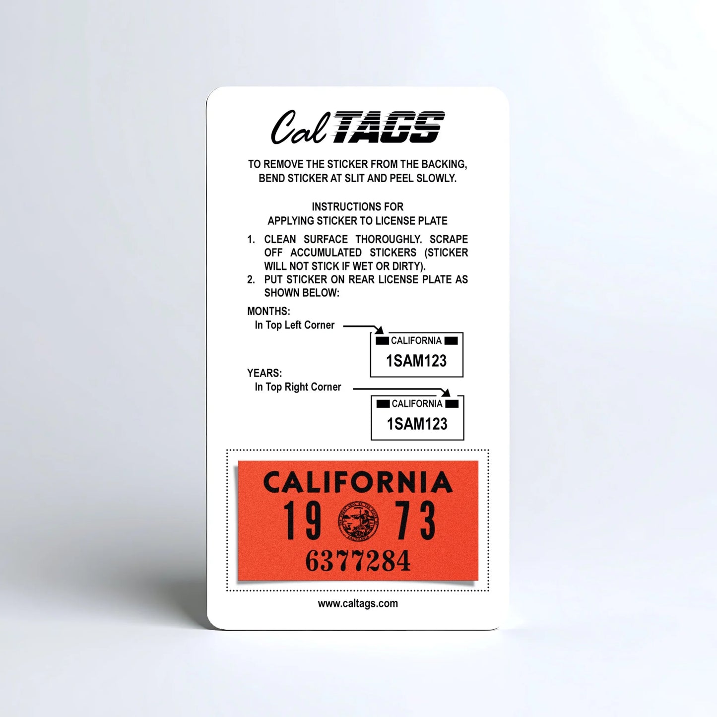 California license plate 1973 year sticker mounted on CalTags display card — YOM Series