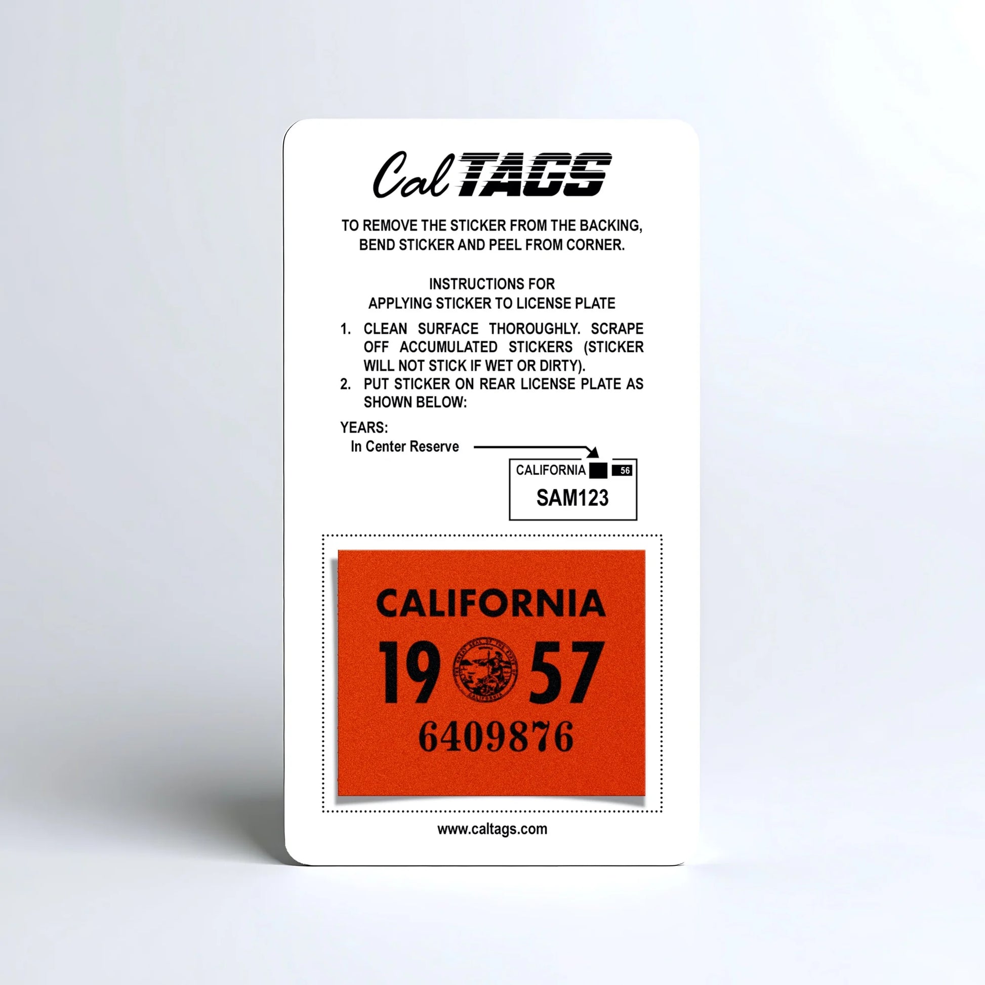 California license plate 1957 year sticker mounted on CalTags display card — YOM Series