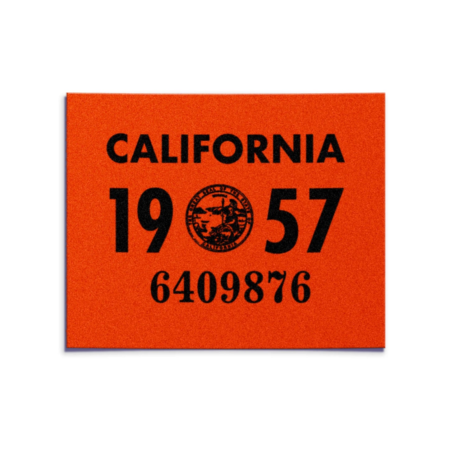 California license plate 1957 year sticker — YOM Series — reproduction shown on white background