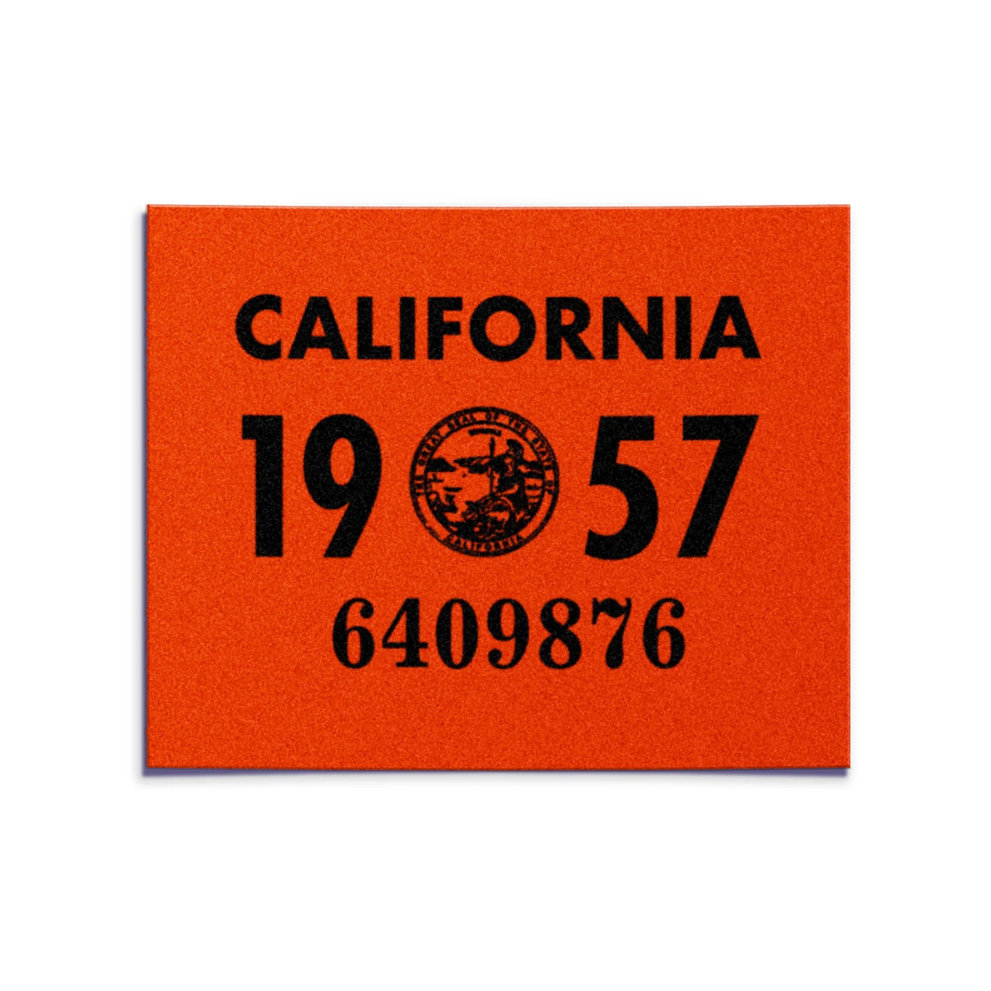 California license plate 1957 year sticker — YOM Series — reproduction shown on white background