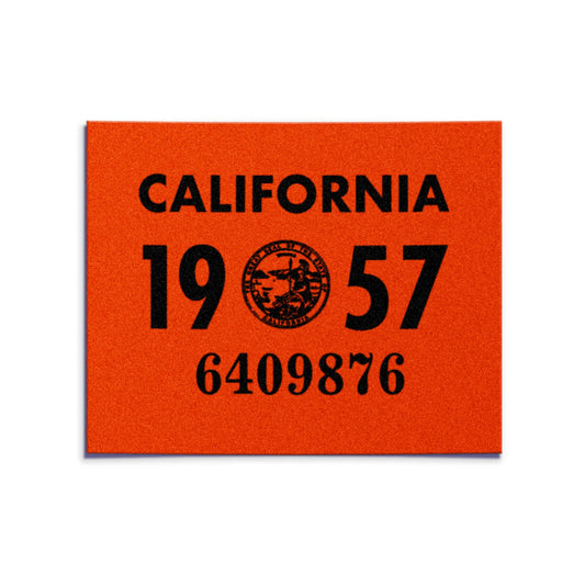 California license plate 1957 year sticker — YOM Series — reproduction shown on white background