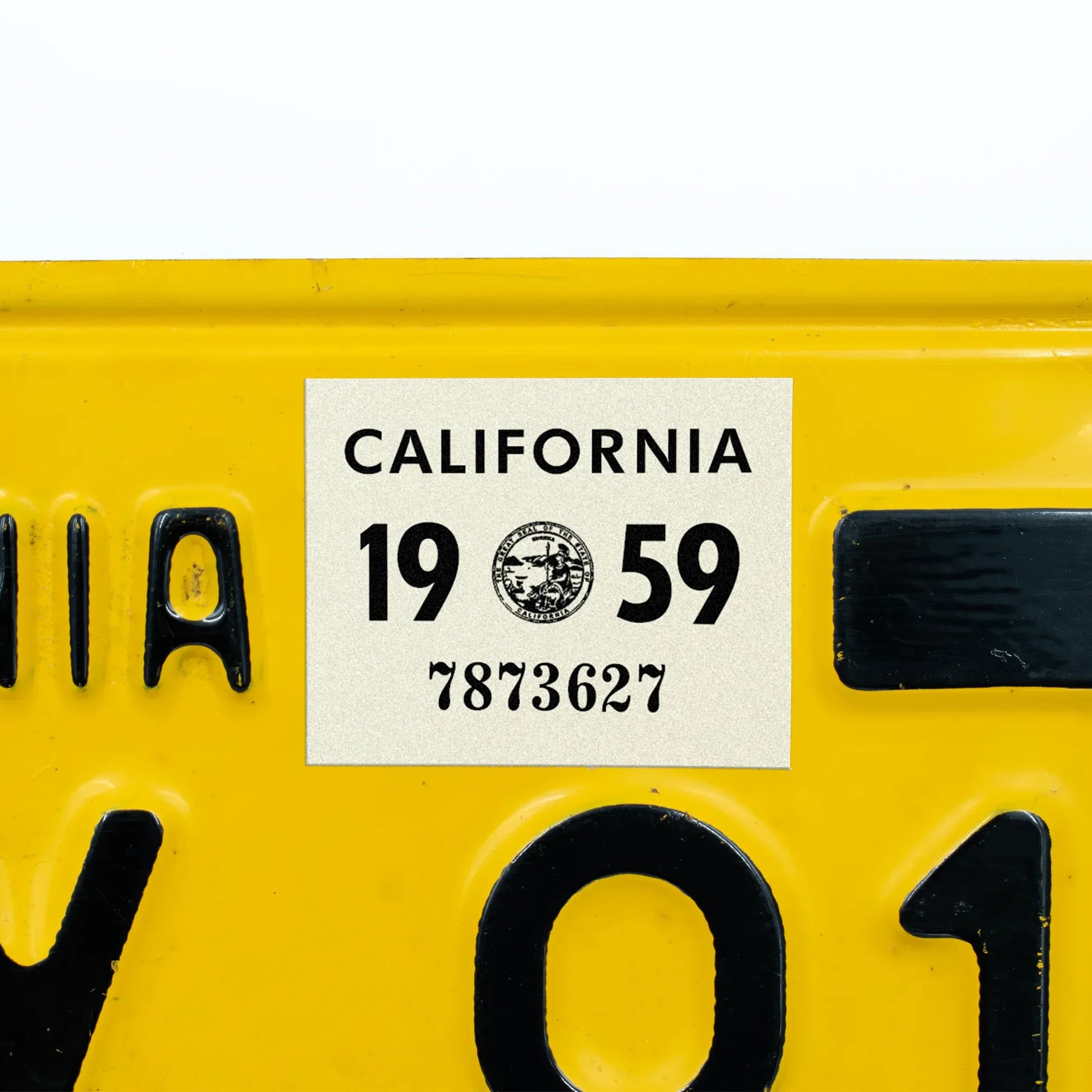 California license plate 1959 year sticker applied to yellow California plate — YOM Series