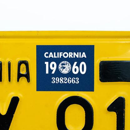 California license plate 1960 year sticker applied to yellow California plate — YOM Series