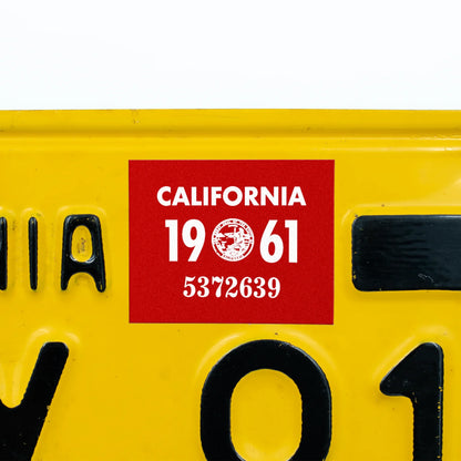 California license plate 1961 year sticker applied to yellow California plate — YOM Series