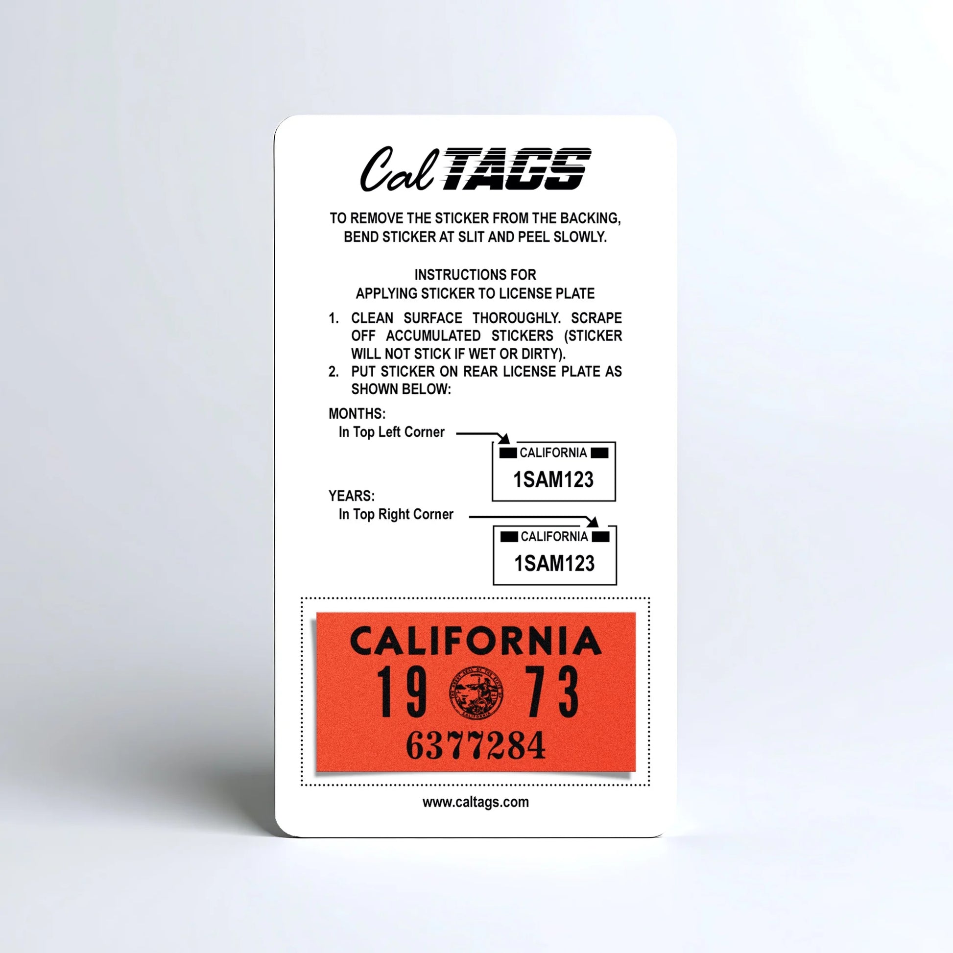 California license plate 1973 year sticker mounted on CalTags display card — YOM Series