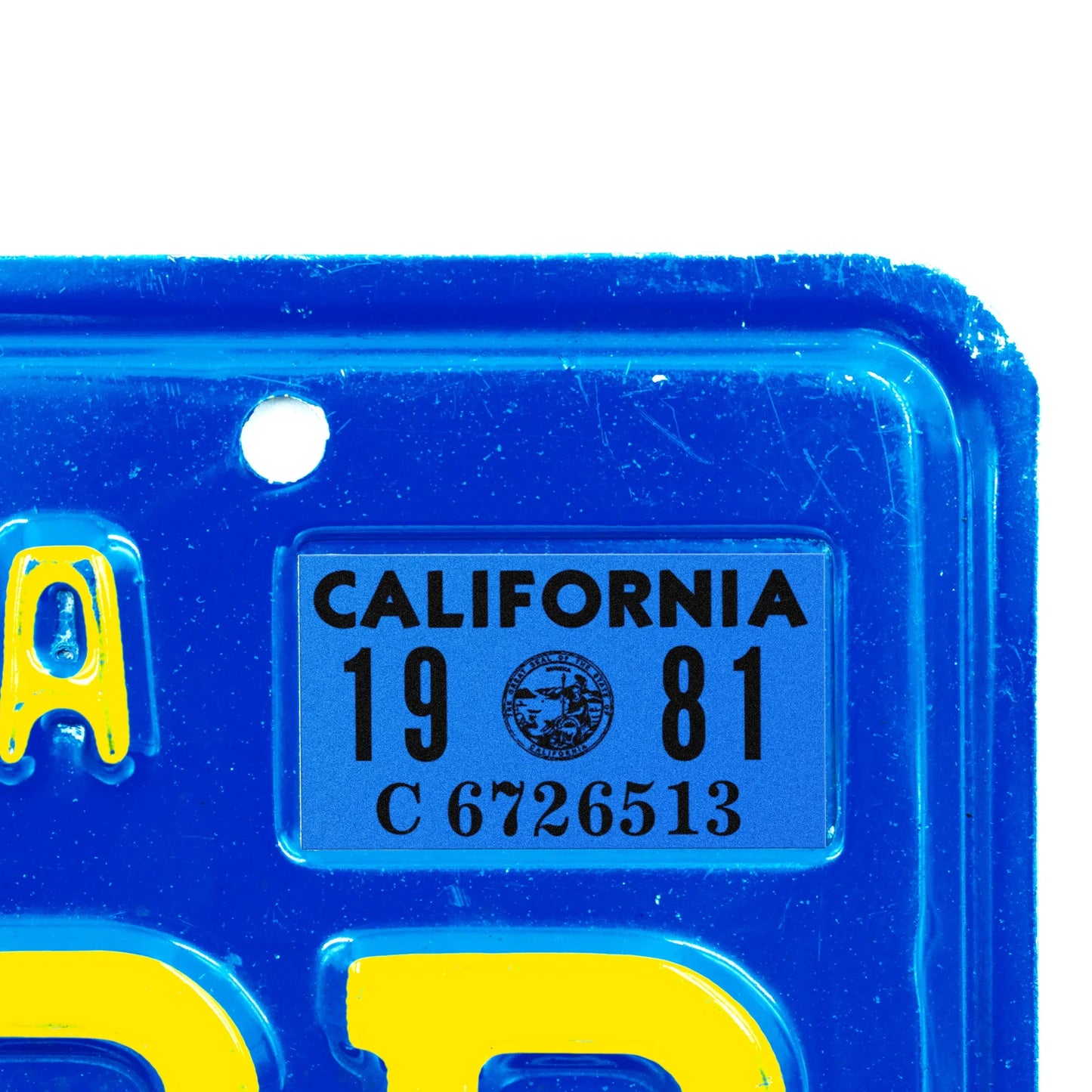 California license plate 1981 year sticker applied to upper corner of blue California plate — Classic Series