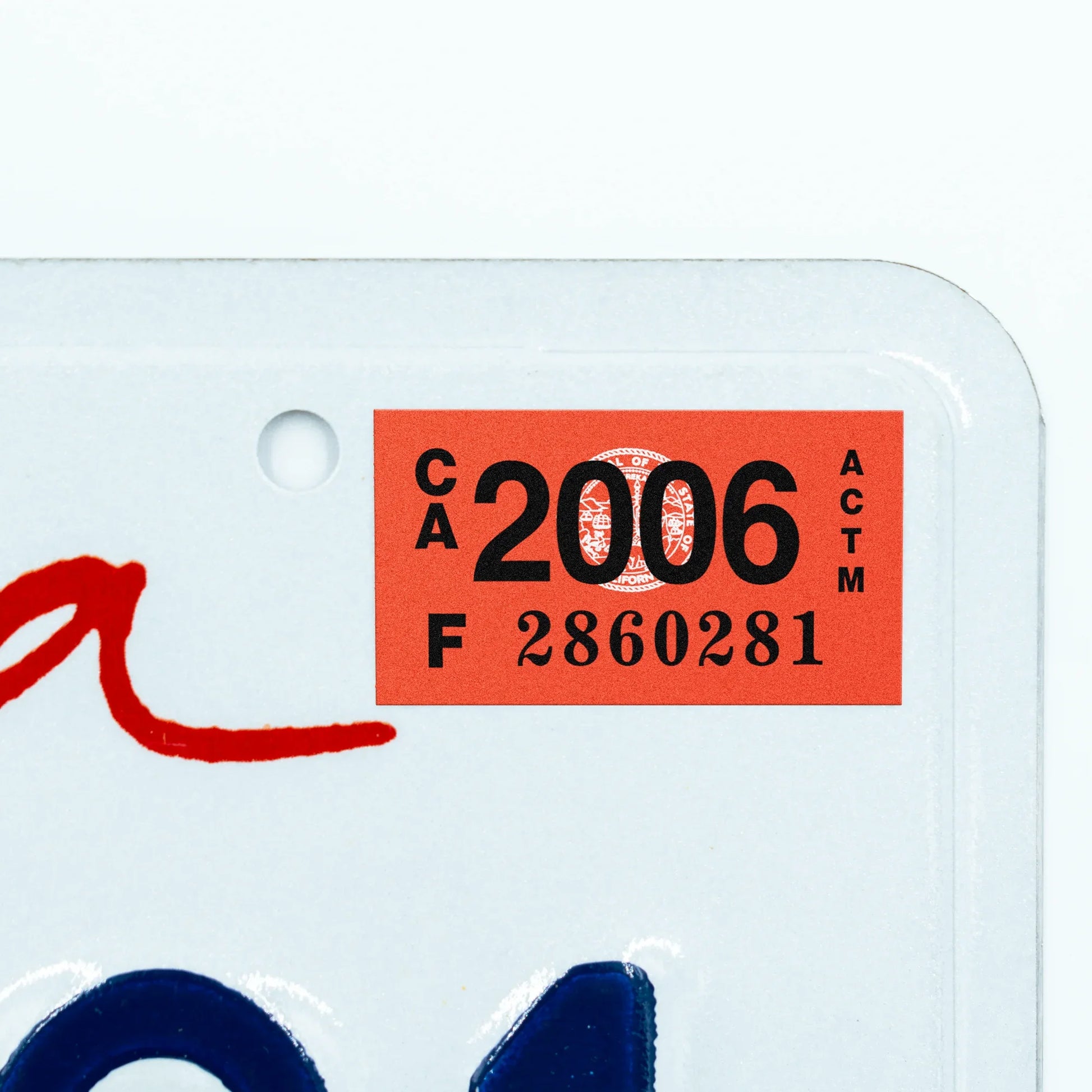 California license plate 2006 year sticker applied to upper corner of white California plate — Classic Series