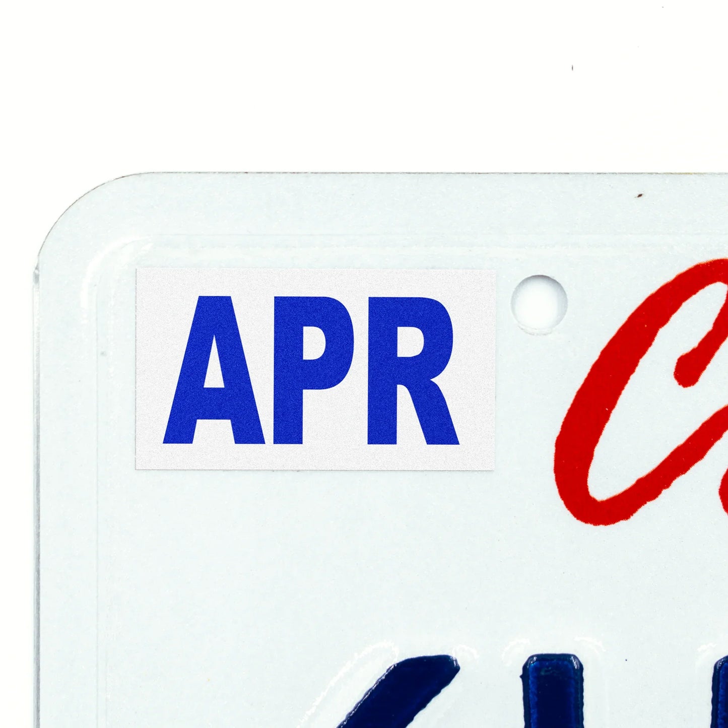 California license plate April month sticker applied to upper corner of white California plate — Modern Series