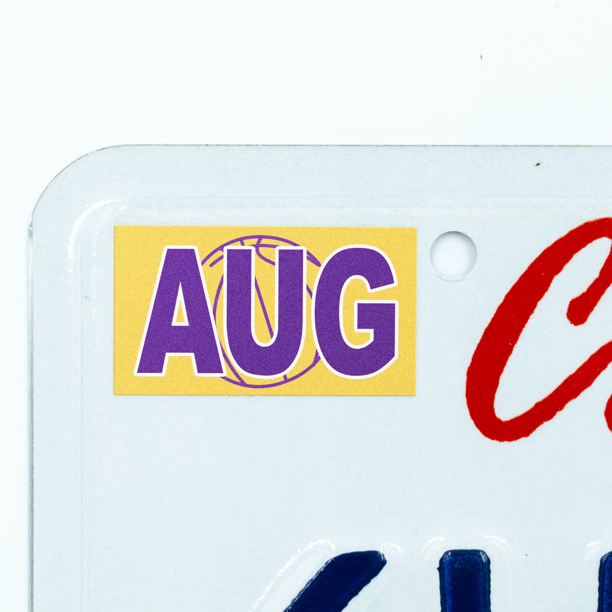 California license plate August month sticker applied to upper corner of white California plate — Courtside Series