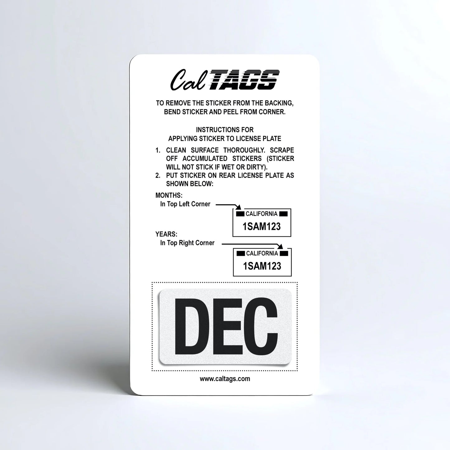 California license plate December month sticker mounted on CalTags display card — Black Series
