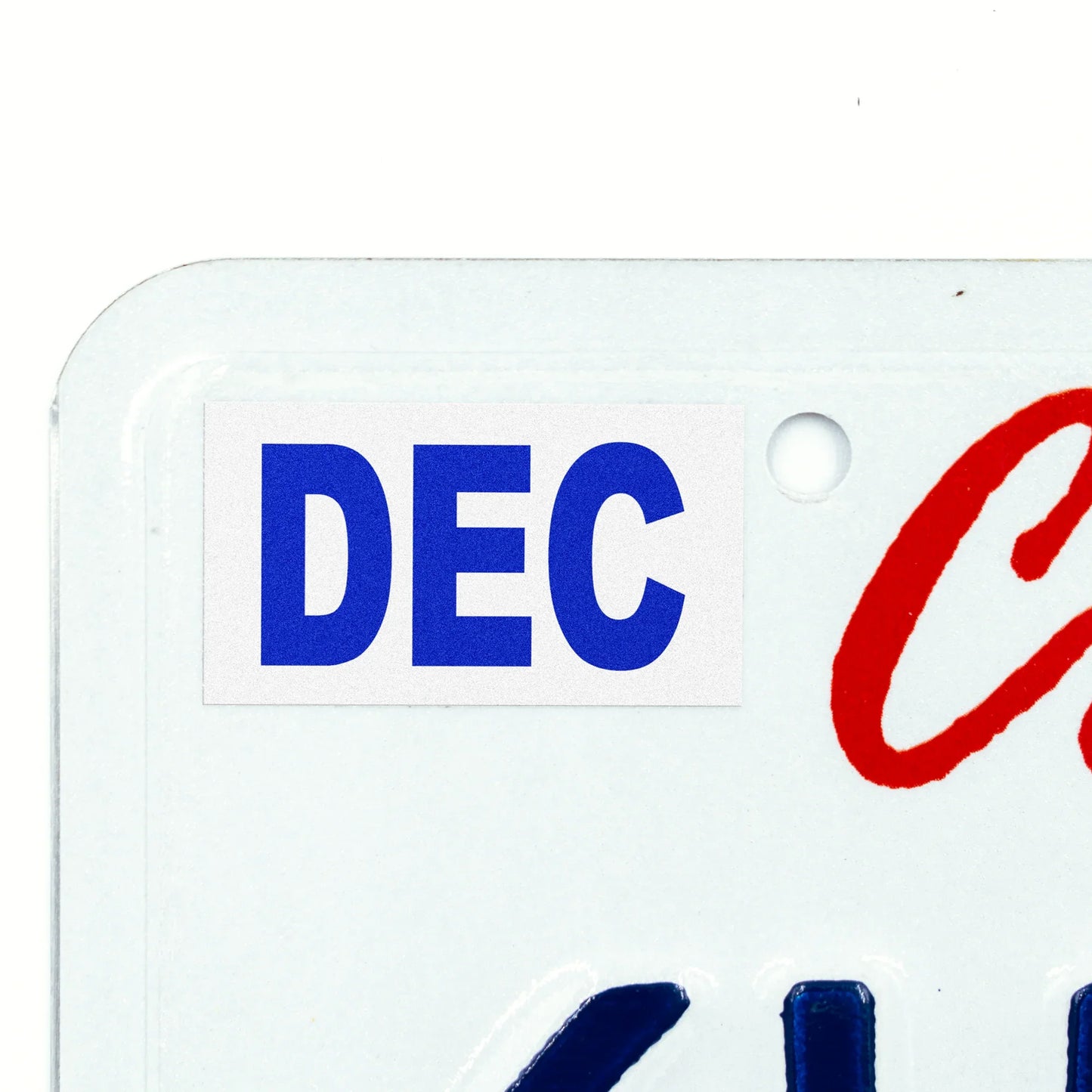 California license plate December month sticker applied to upper corner of white California plate — Modern Series