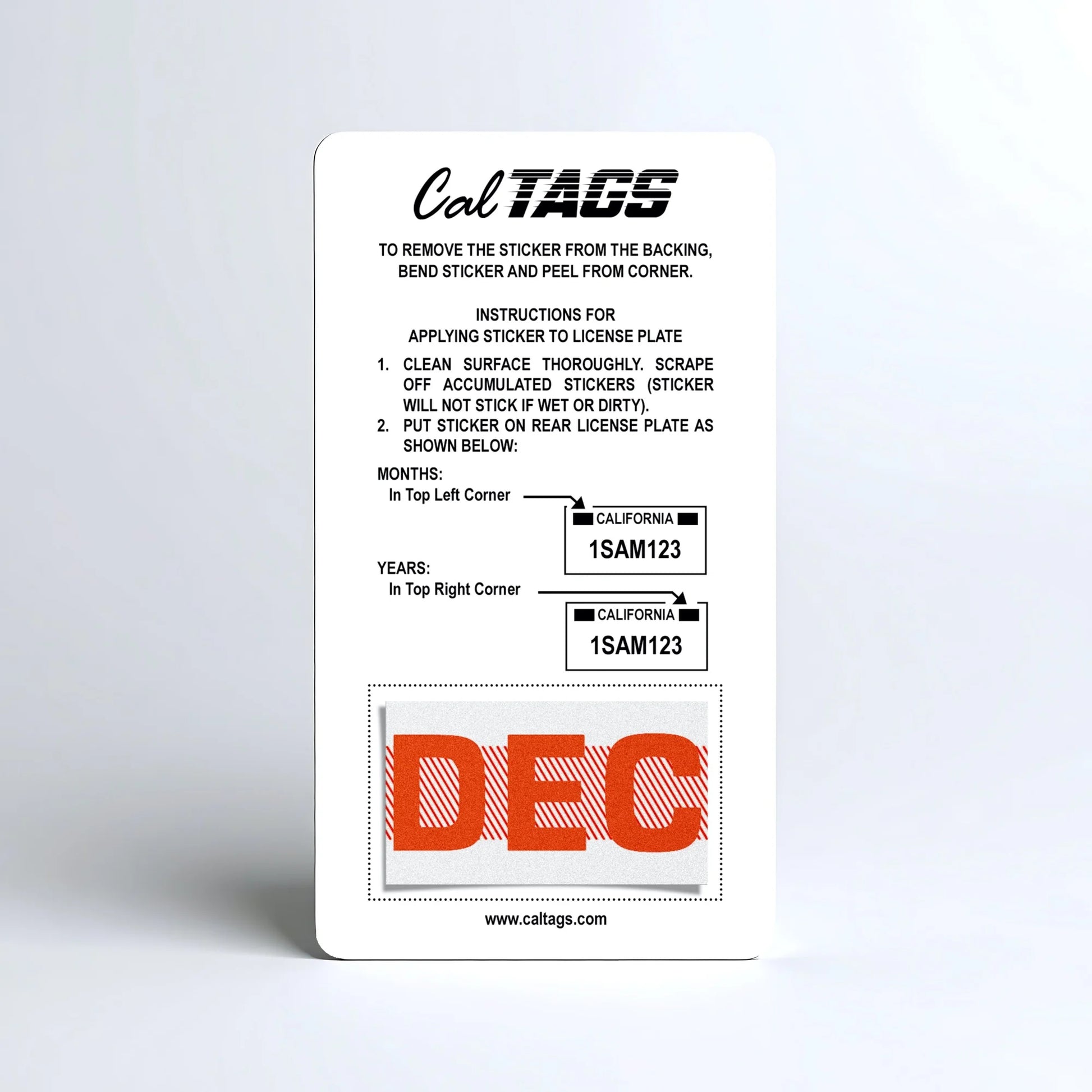California license plate December month sticker mounted on CalTags display card — Red Series