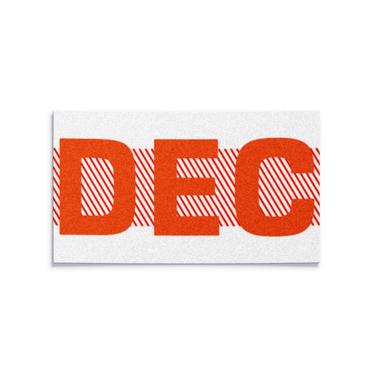 California license plate December month sticker — Red Series — reproduction shown on white background