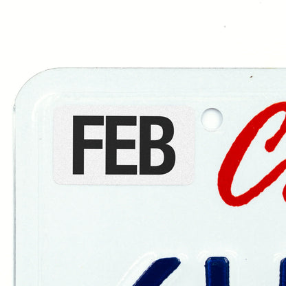 California license plate February month sticker applied to upper corner of white California plate — Black Series
