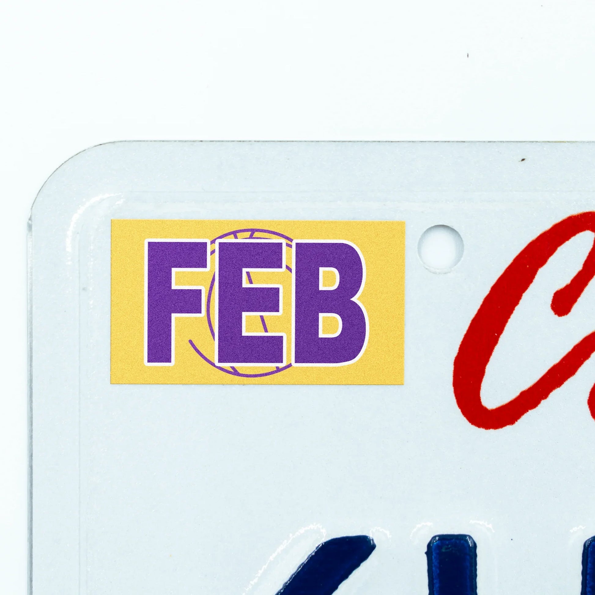 California license plate February month sticker applied to upper corner of white California plate — Courtside Series