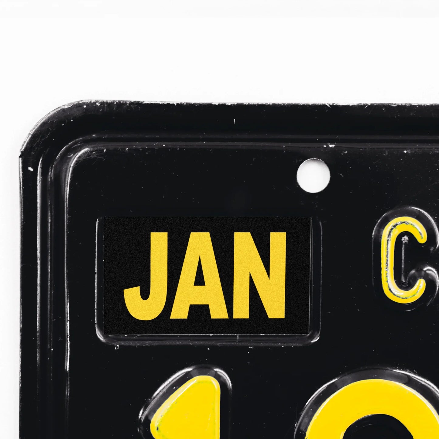 California license plate January month sticker applied to upper corner of black California plate — Legacy Series
