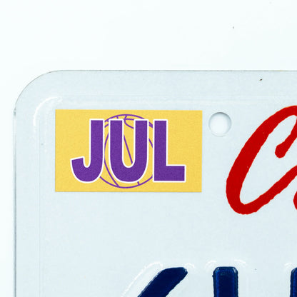 California license plate July month sticker applied to upper corner of white California plate — Courtside Series