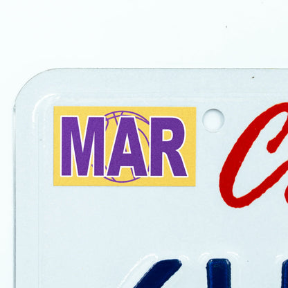 California license plate March month sticker applied to upper corner of white California plate — Courtside Series