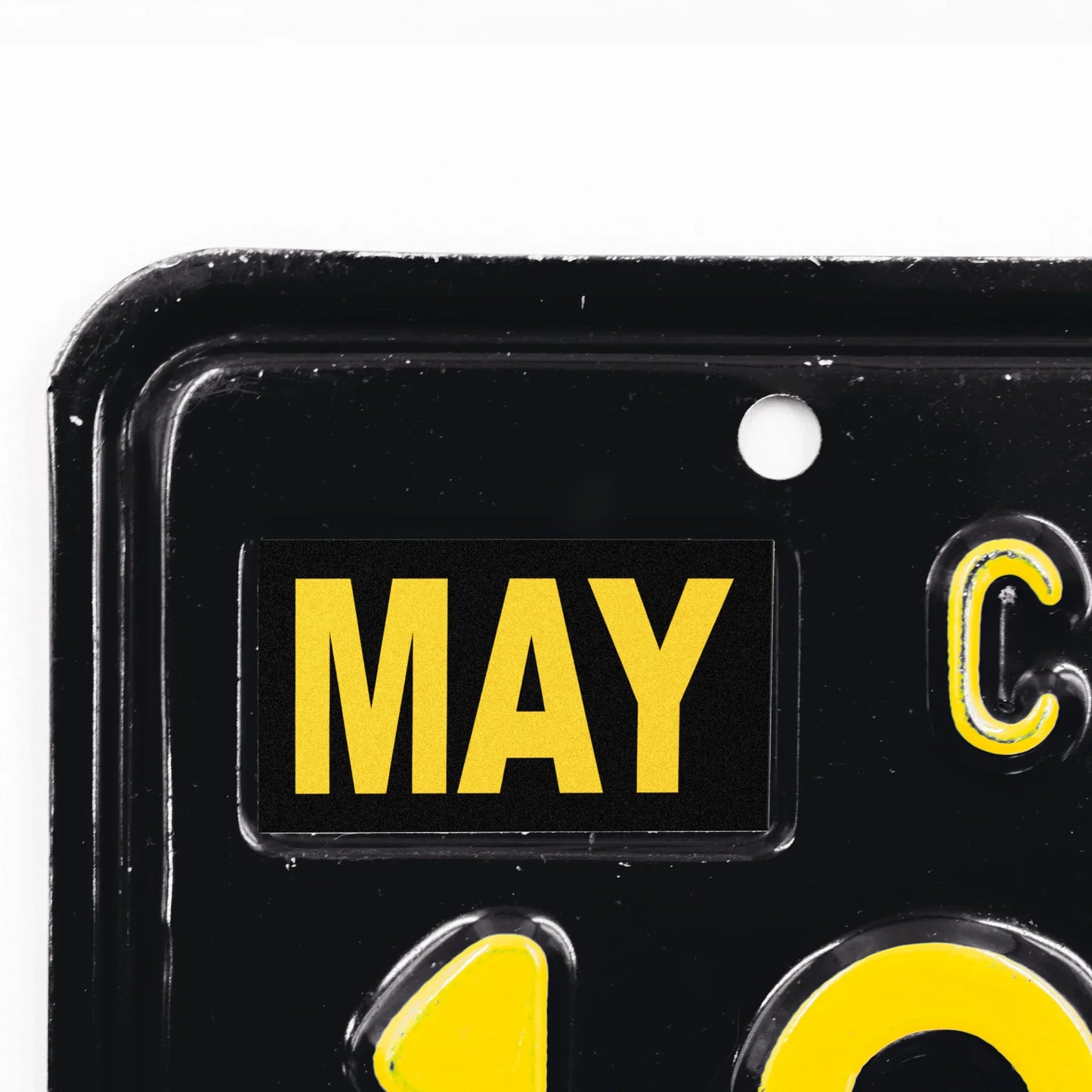 California license plate May month sticker applied to upper corner of black California plate — Legacy Series