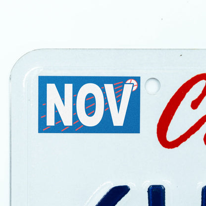 California license plate November month sticker applied to upper corner of white California plate — Ballpark Series