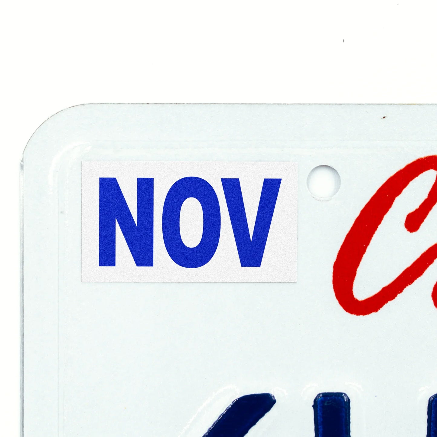 California license plate November month sticker applied to upper corner of white California plate — Modern Series