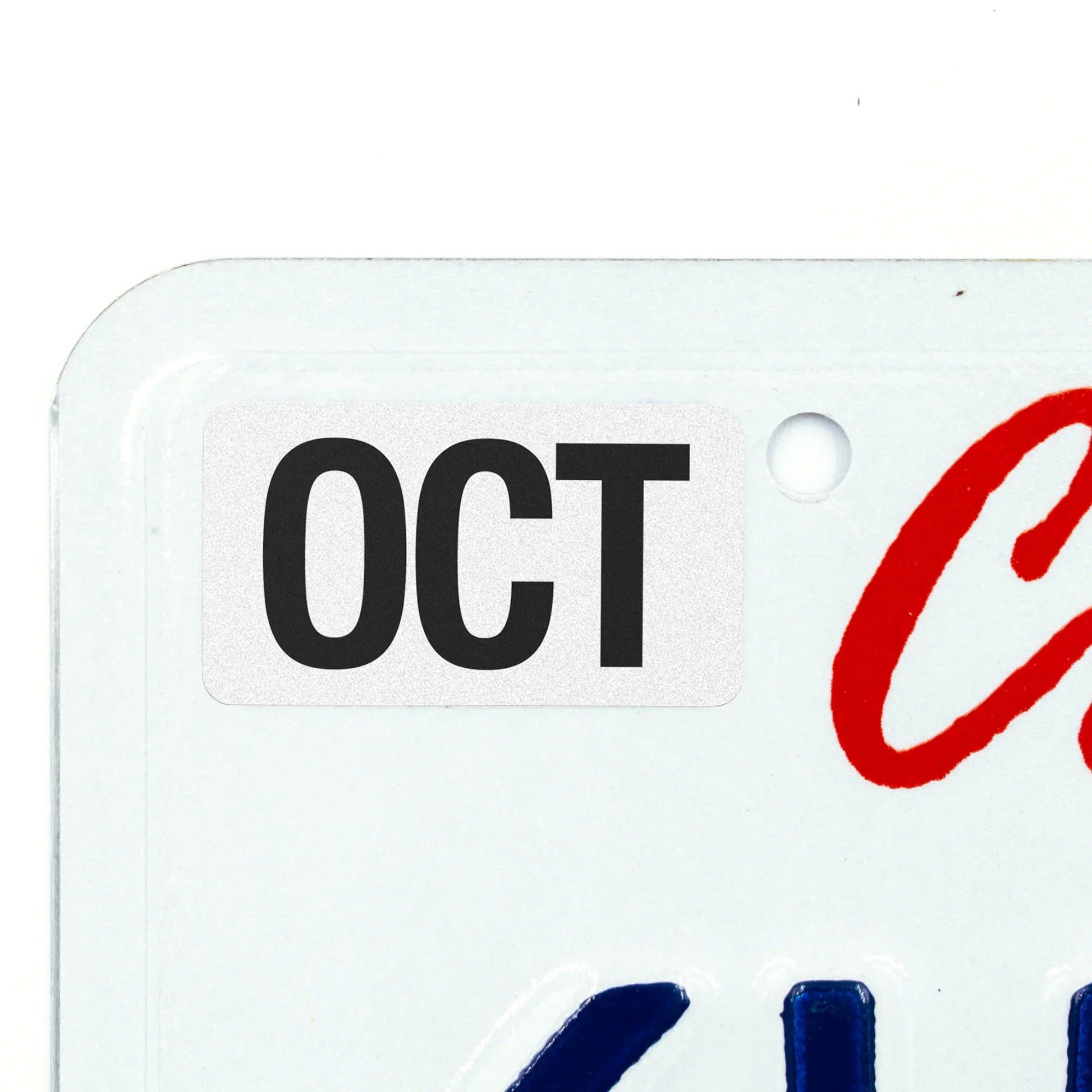 California license plate October month sticker applied to upper corner of white California plate — Black Series