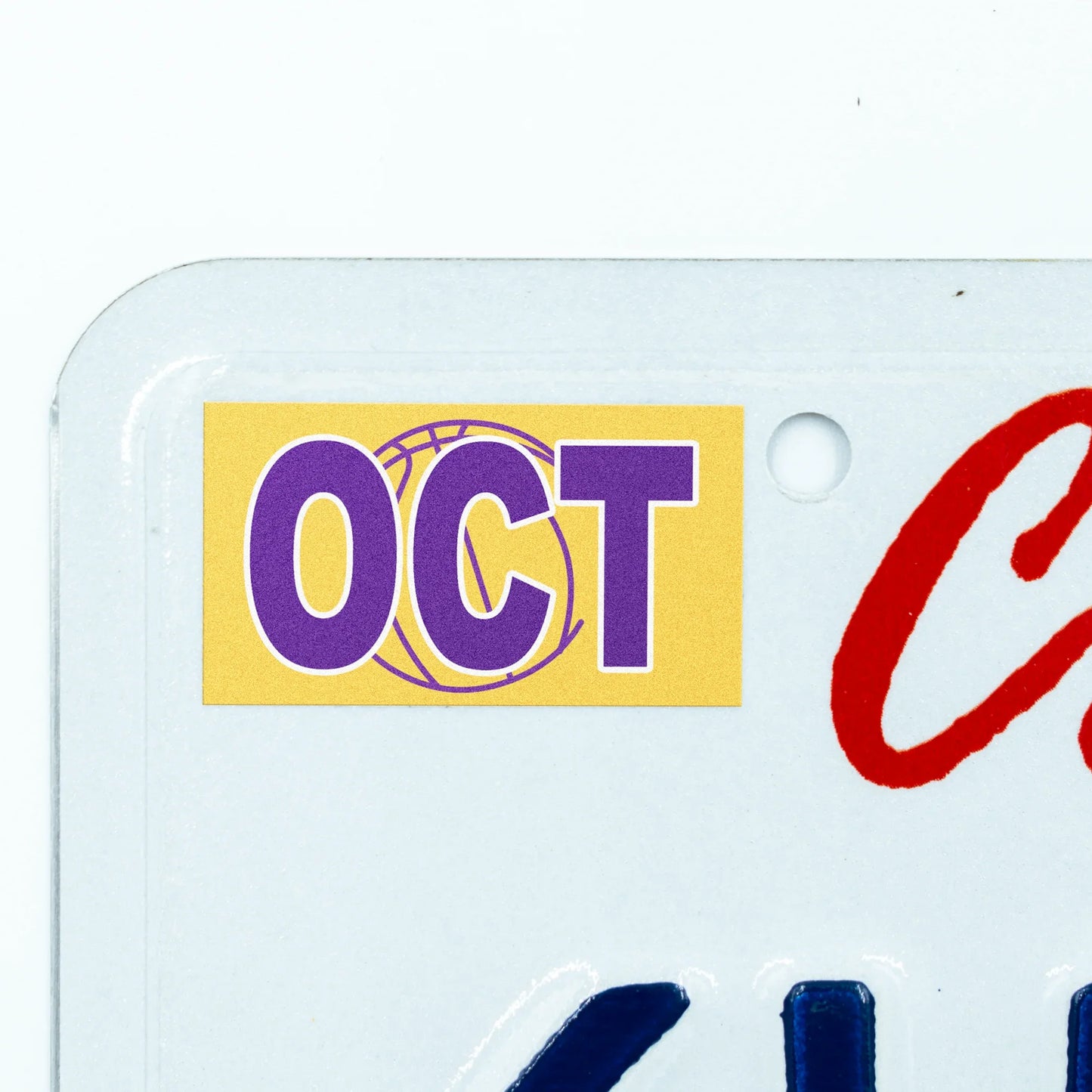 California license plate October month sticker applied to upper corner of white California plate — Courtside Series