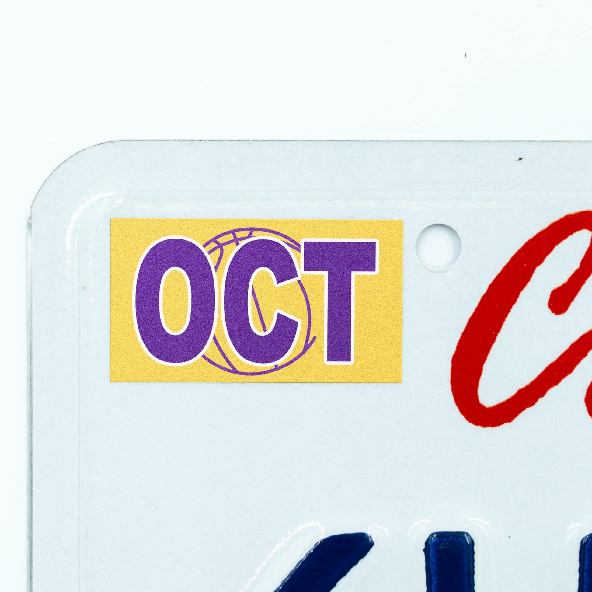 California license plate October month sticker applied to upper corner of white California plate — Courtside Series