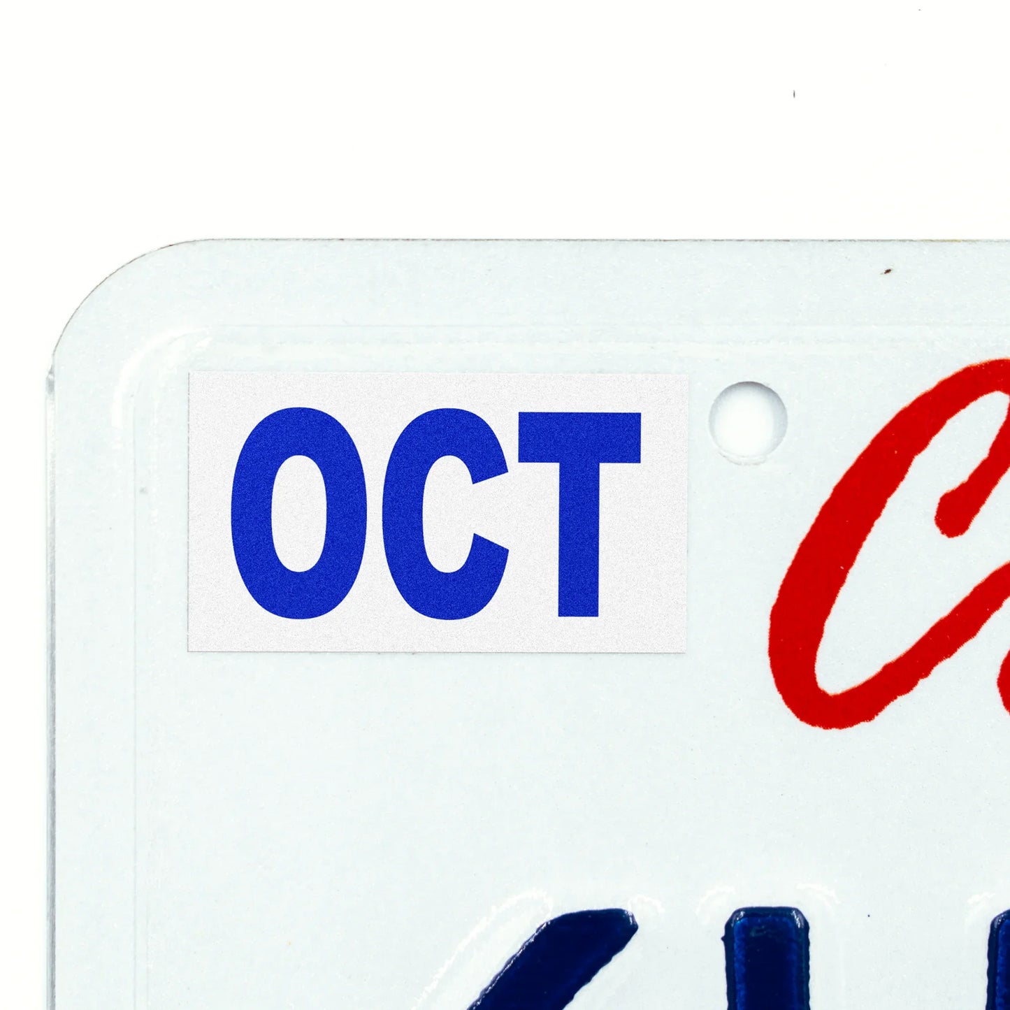 California license plate October month sticker applied to upper corner of white California plate — Modern Series
