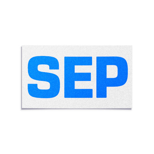 California license plate September month sticker — Blue Series — reproduction shown on white background