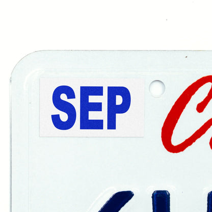 California license plate September month sticker applied to upper corner of white California plate — Modern Series