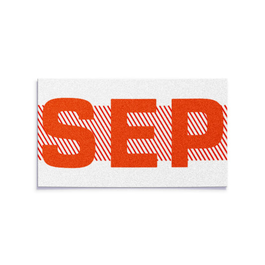 California license plate September month sticker — Red Series — reproduction shown on white background